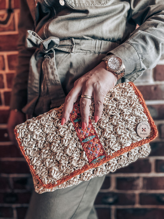 Handmade crochet summer clutch bag designed by Zein Crochet Designs
