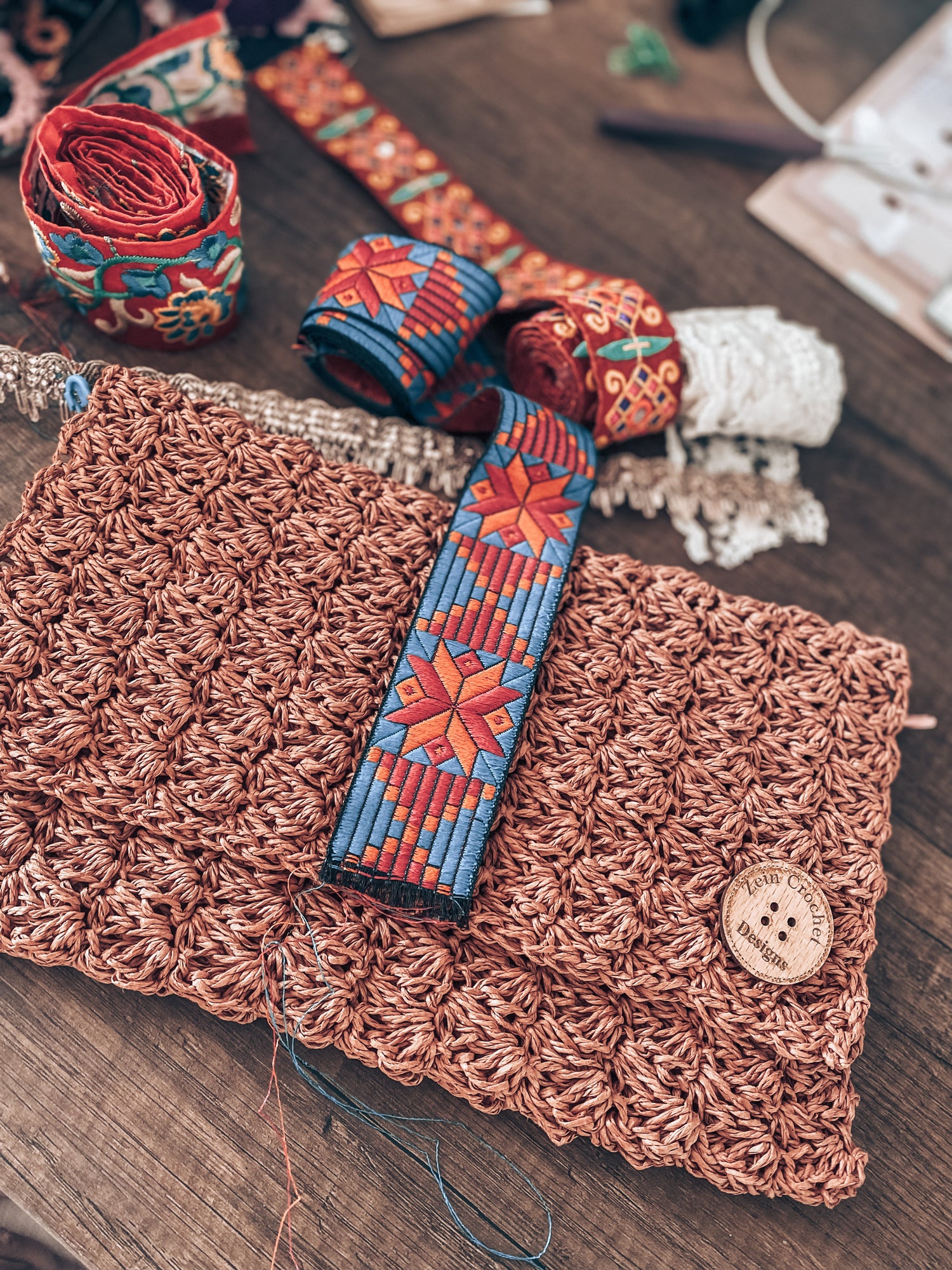 Handmade crochet summer clutch designed by Zein Crochet Designs